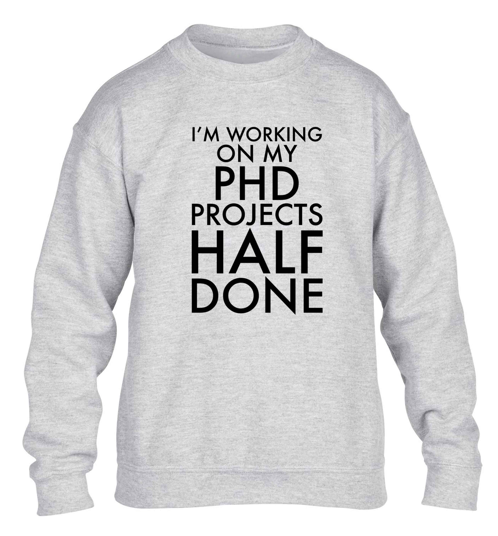 I'm working on my PHD projects half done children's grey sweater 12-13 Years