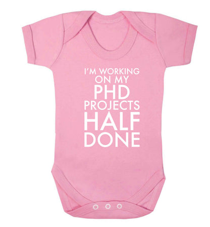 I'm working on my PHD projects half done Baby Vest pale pink 18-24 months