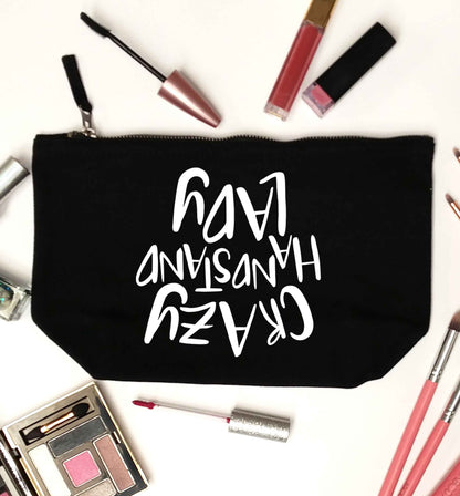 Crazy handstand lady black makeup bag