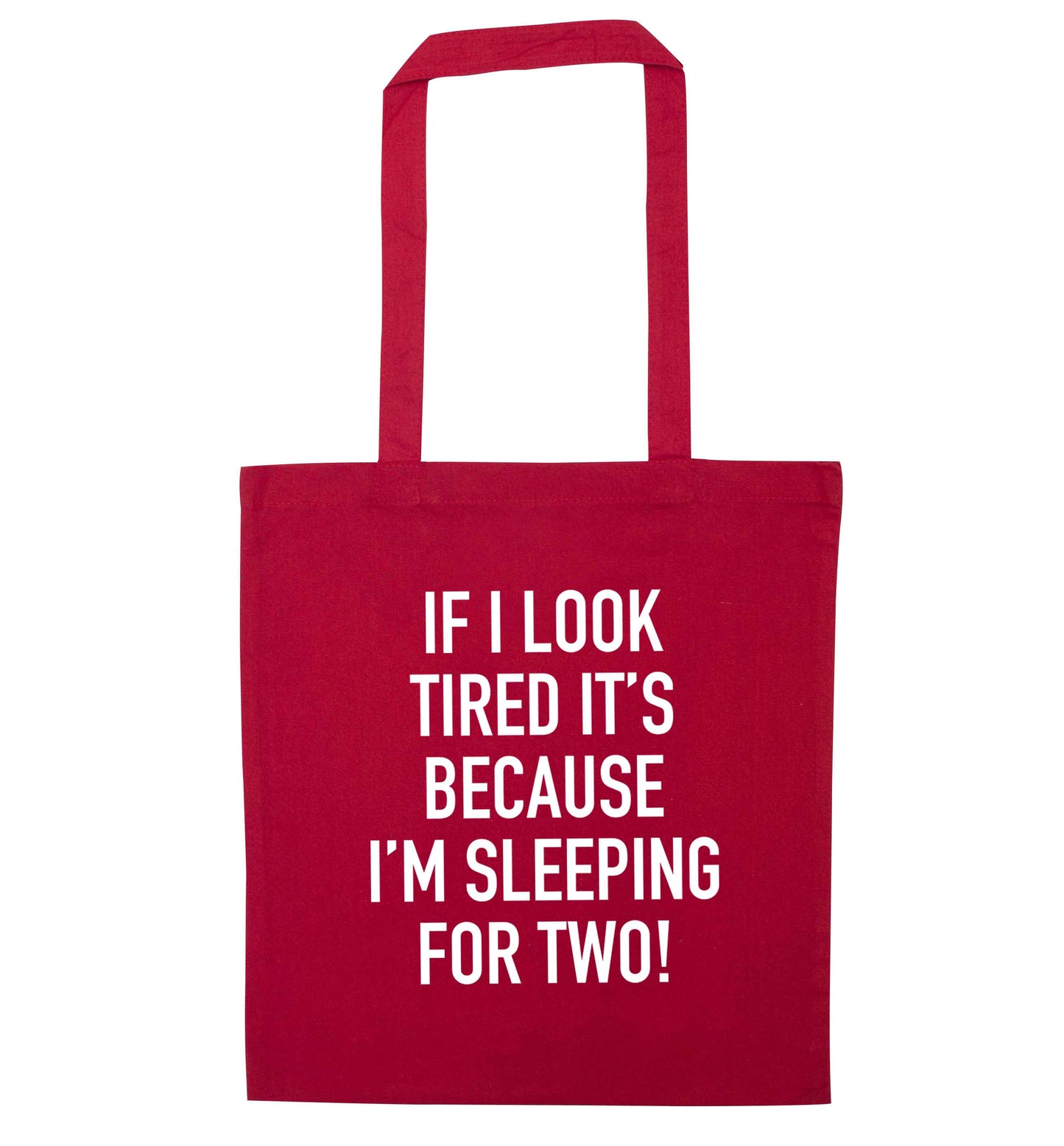 If I look tired it's because I'm sleeping for two red tote bag