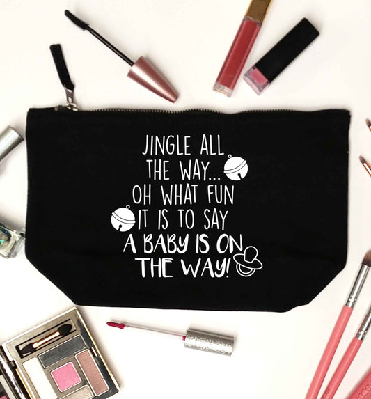 Oh what fun it is to say a baby is on the way! black makeup bag