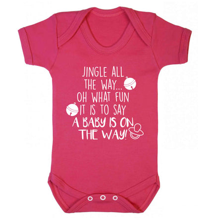 Oh what fun it is to say a baby is on the way! Baby Vest dark pink 18-24 months