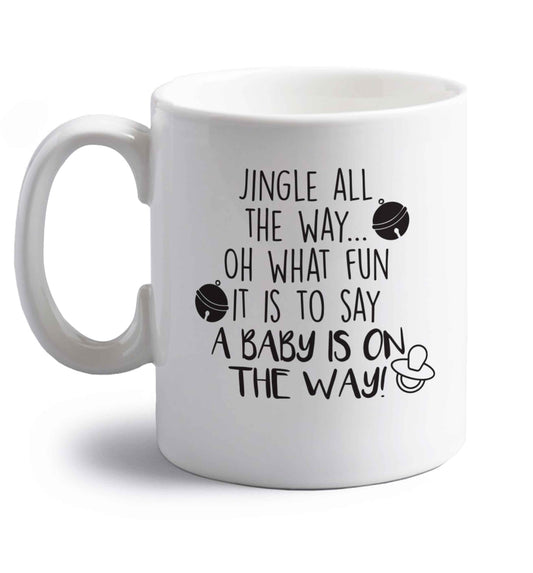 Oh what fun it is to say a baby is on the way! right handed white ceramic mug 