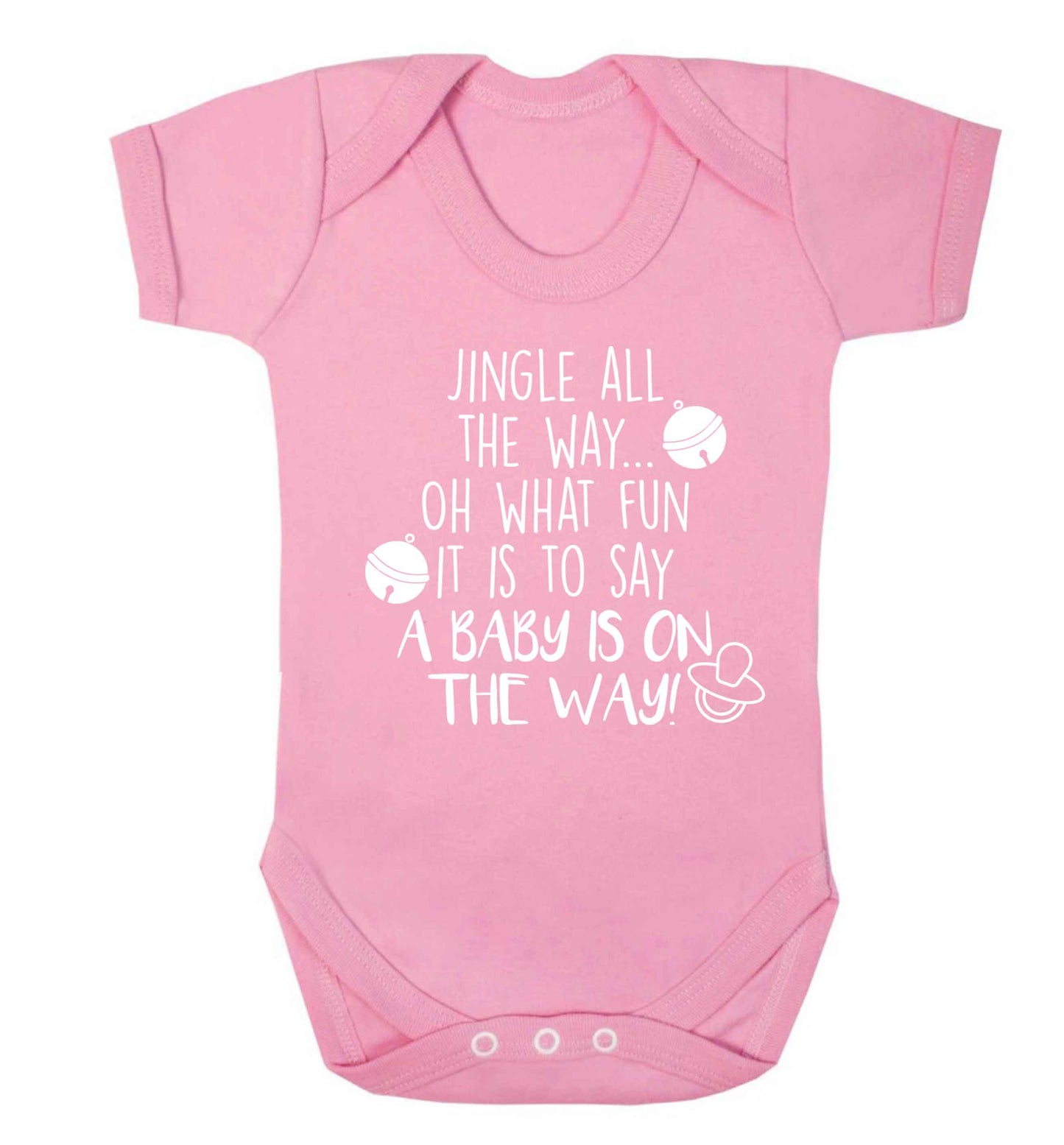 Oh what fun it is to say a baby is on the way! Baby Vest pale pink 18-24 months