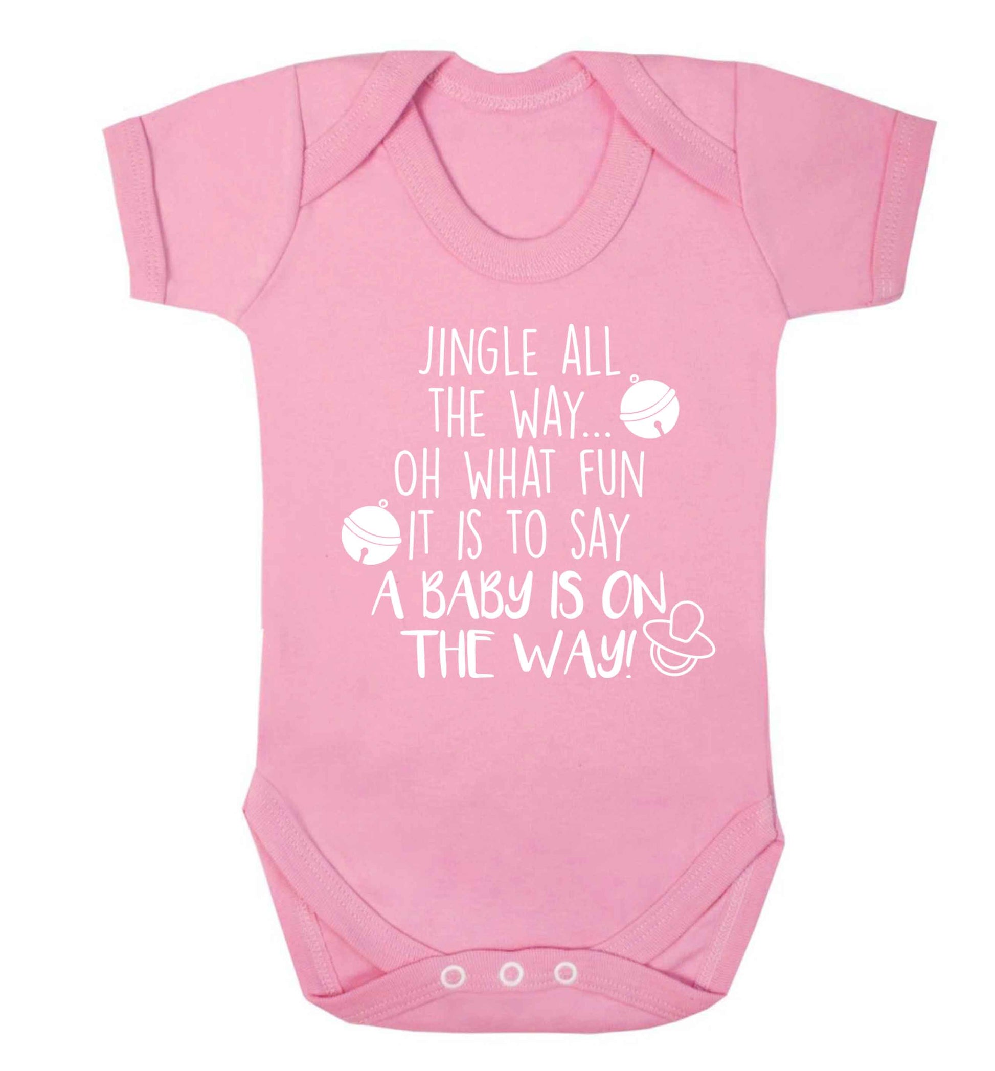 Oh what fun it is to say a baby is on the way! Baby Vest pale pink 18-24 months