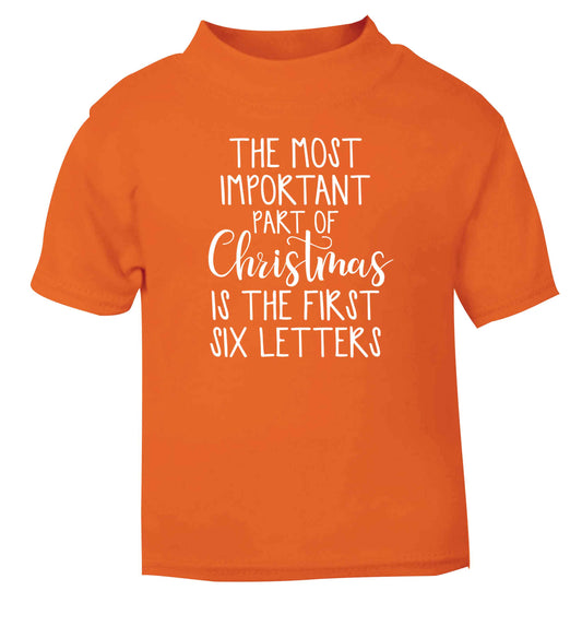 The most important thing about Christmas is the first six letters orange Baby Toddler Tshirt 2 Years