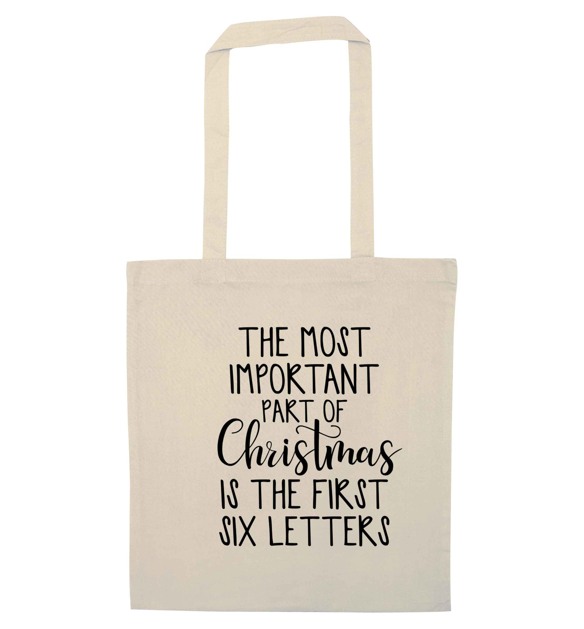The most important thing about Christmas is the first six letters natural tote bag