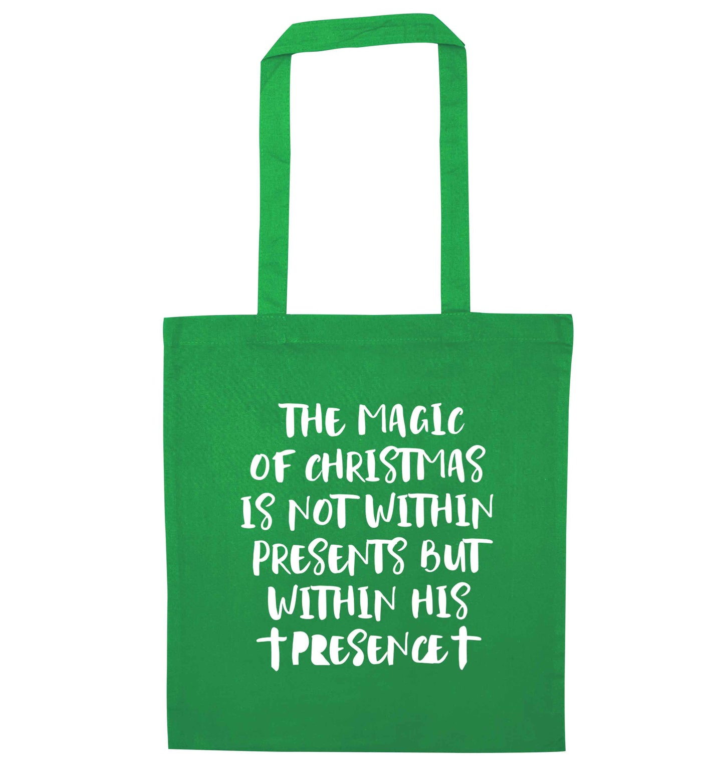 The magic of Christmas is not within presents but within his presence green tote bag