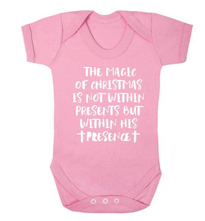The magic of Christmas is not within presents but within his presence Baby Vest pale pink 18-24 months