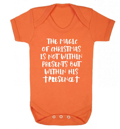 The magic of Christmas is not within presents but within his presence Baby Vest orange 18-24 months