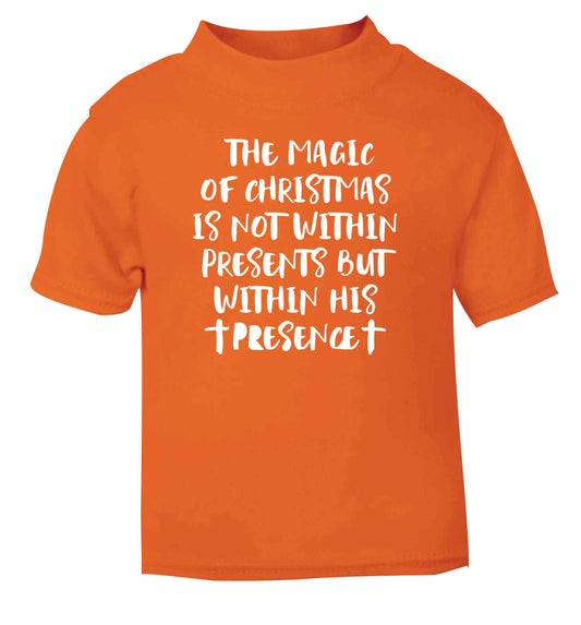 The magic of Christmas is not within presents but within his presence orange Baby Toddler Tshirt 2 Years