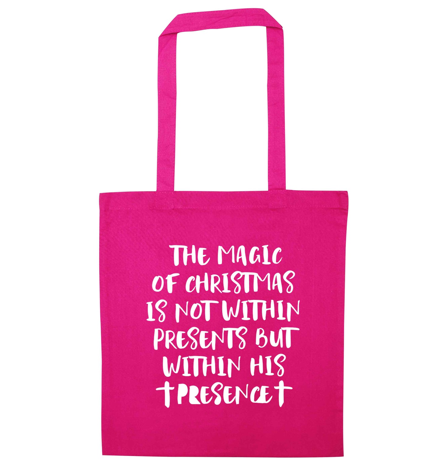 The magic of Christmas is not within presents but within his presence pink tote bag