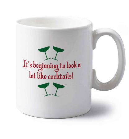 It's beginning to look a lot like cocktails left handed white ceramic mug 