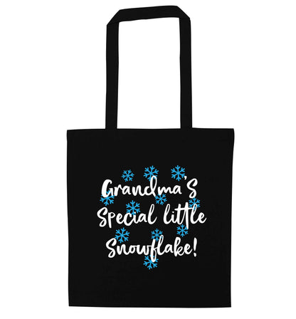 Grandma's special little snowflake black tote bag