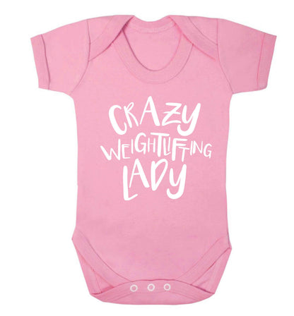 Crazy weightlifting lady Baby Vest pale pink 18-24 months