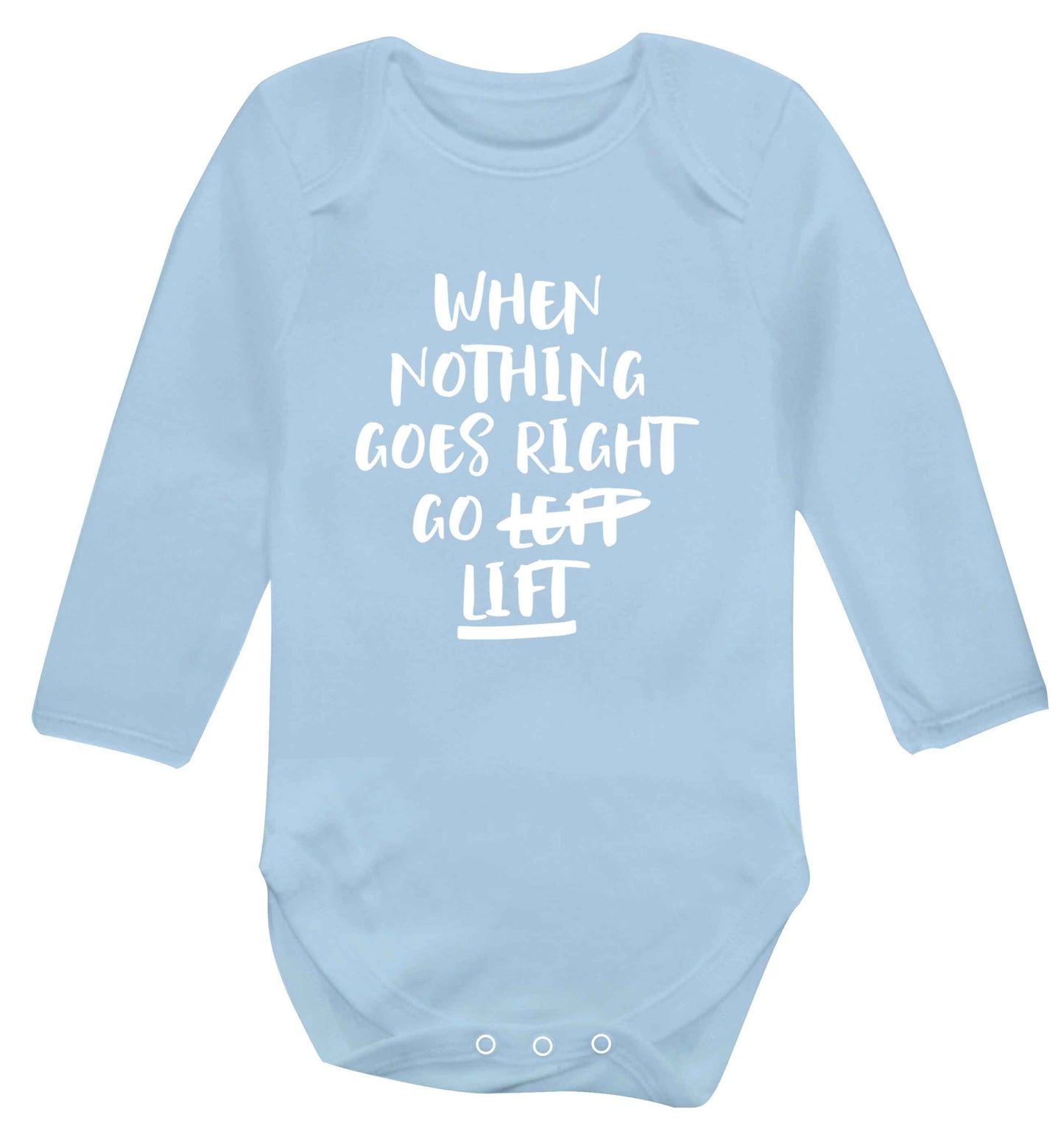 When nothing goes right go lift Baby Vest long sleeved pale blue 6-12 months