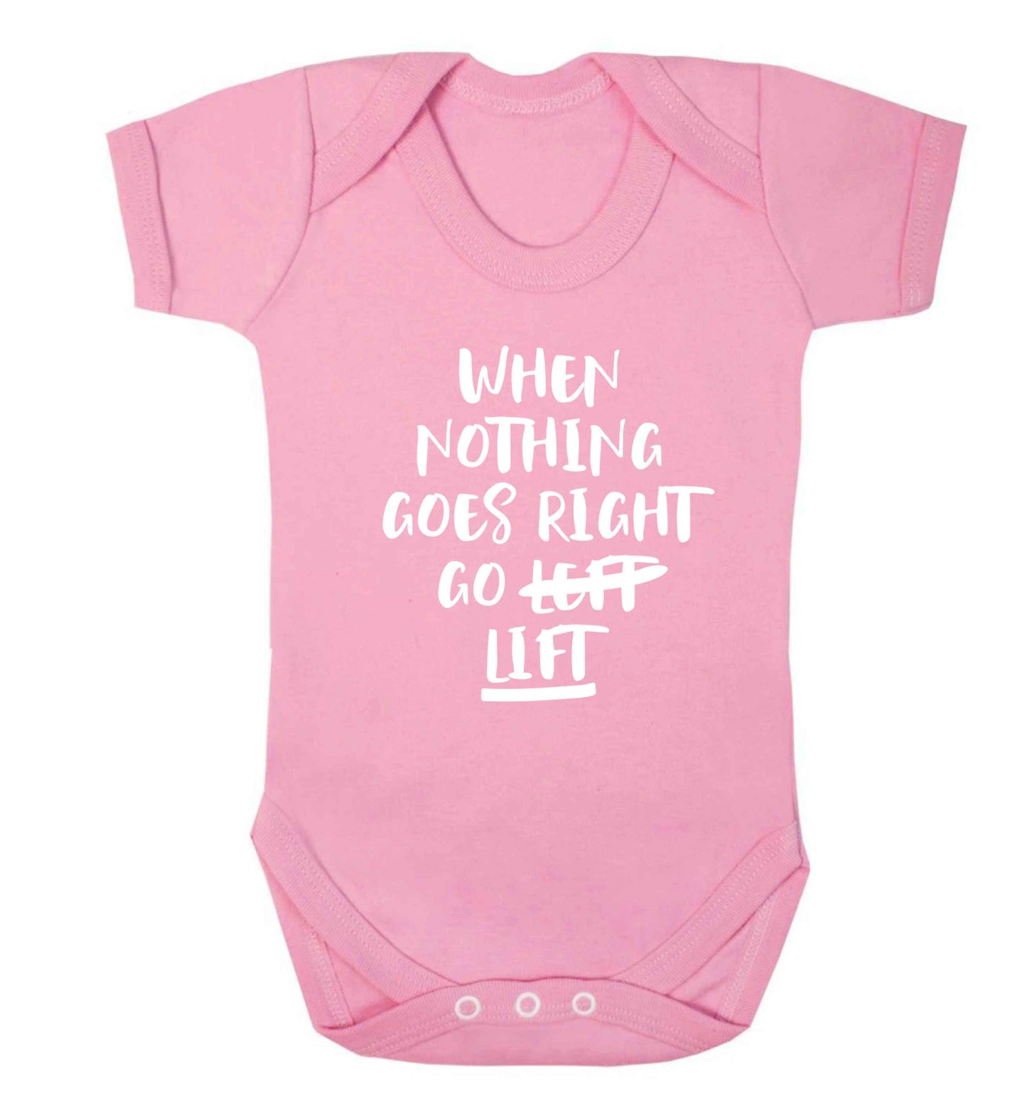 When nothing goes right go lift Baby Vest pale pink 18-24 months
