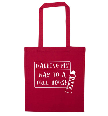 Dabbing my way to a full house red tote bag