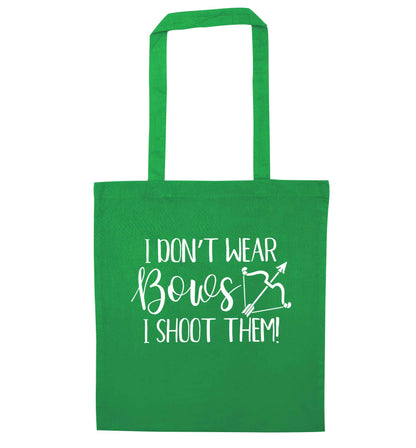 I don't wear bows I shoot them green tote bag