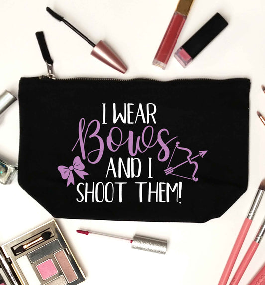 I wear bows and I shoot them black makeup bag