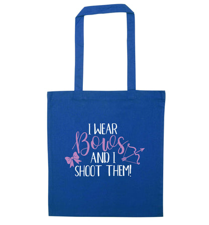 I wear bows and I shoot them blue tote bag
