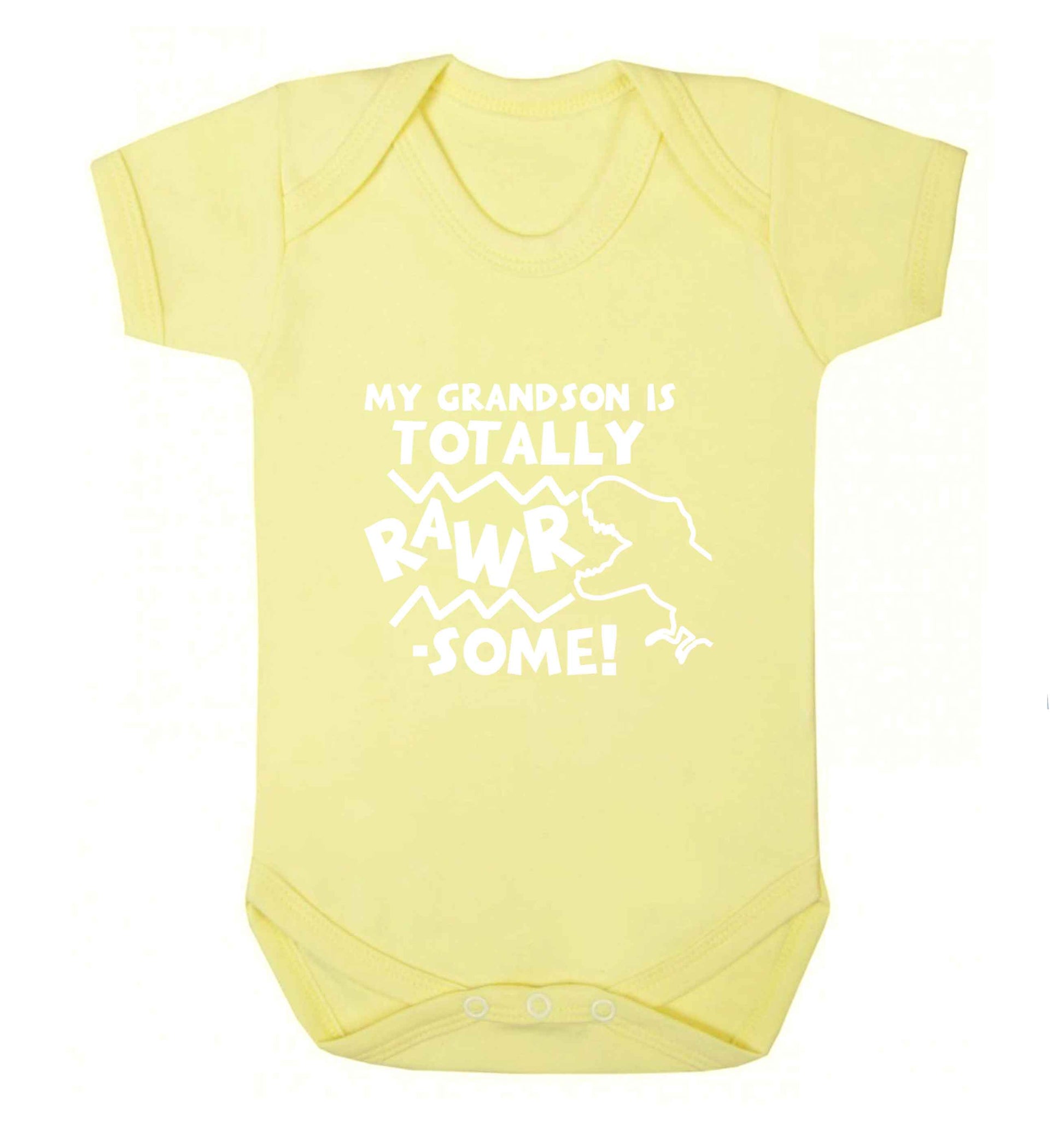 My grandson is totally rawrsome baby vest pale yellow 18-24 months