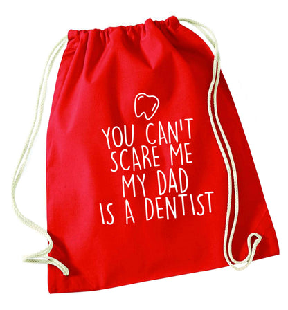 You can't scare me my dad is a dentist red drawstring bag 