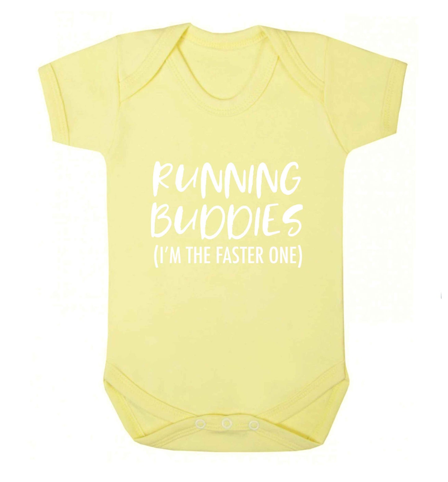 Running buddies (I'm the faster one) baby vest pale yellow 18-24 months