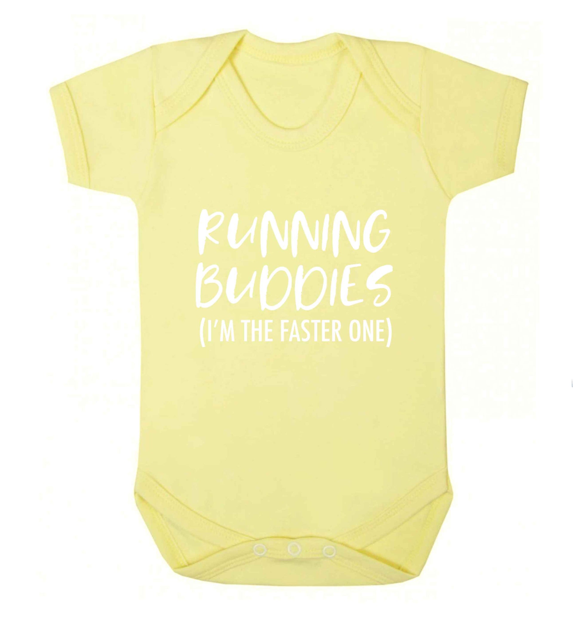 Running buddies (I'm the faster one) baby vest pale yellow 18-24 months