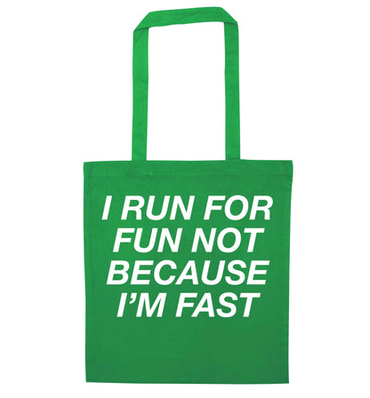 I run for fun not because I'm fast green tote bag