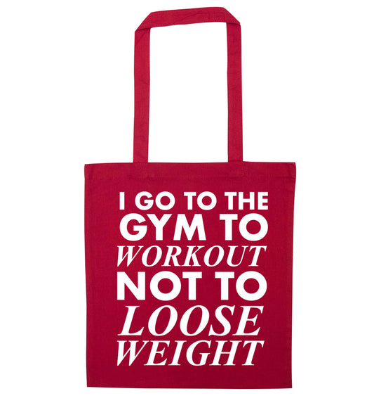 I go to the gym to workout not to loose weight red tote bag