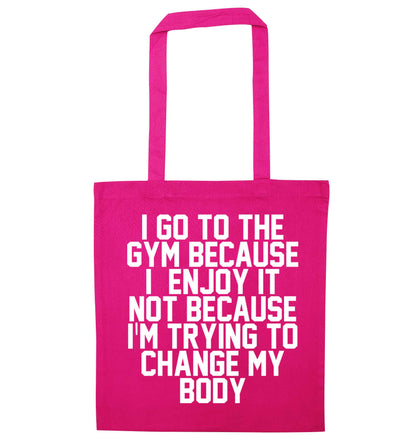 I go to the gym because I enjoy it not because I'm trying to change my body pink tote bag