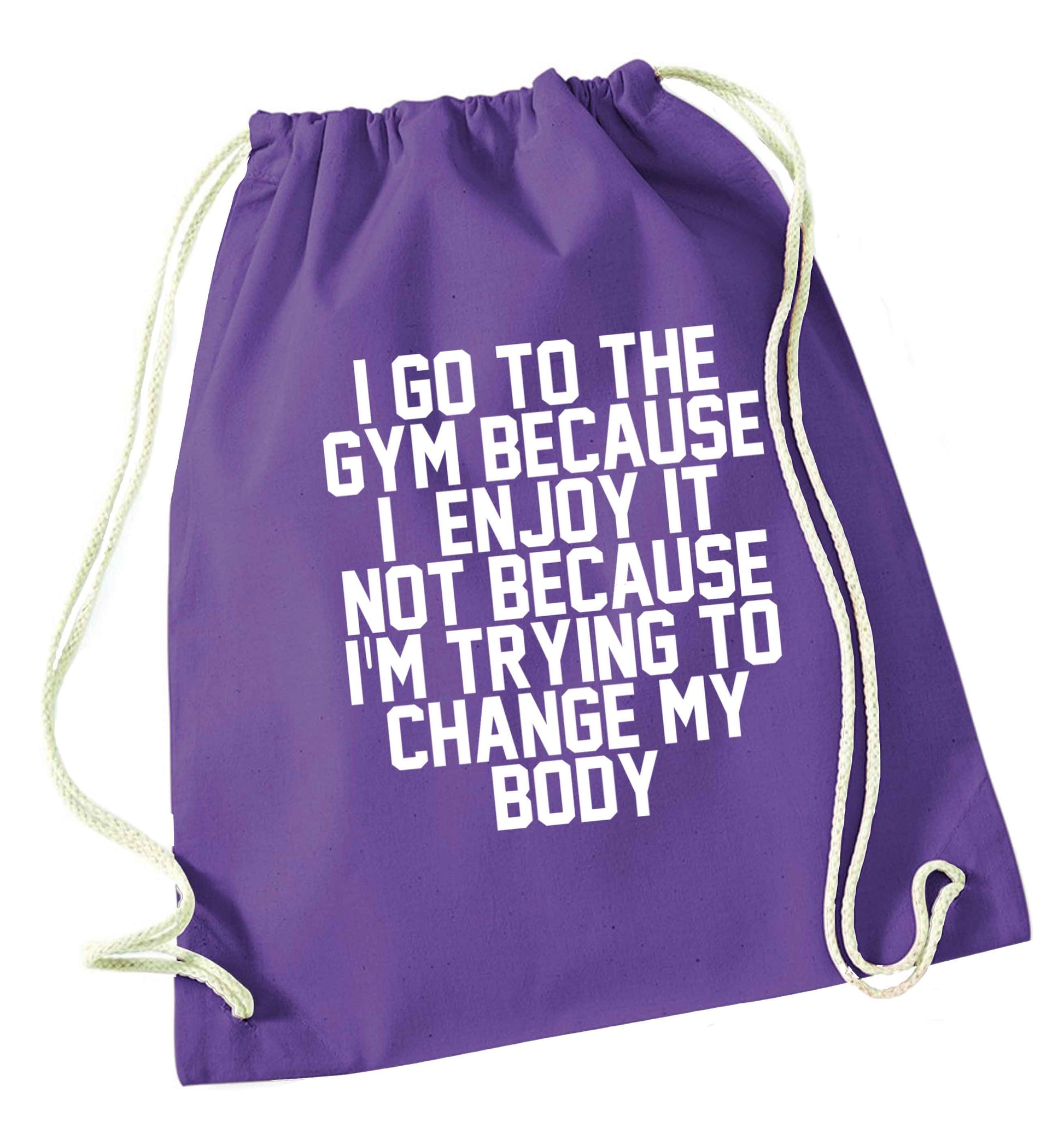I go to the gym because I enjoy it not because I'm trying to change my body purple drawstring bag
