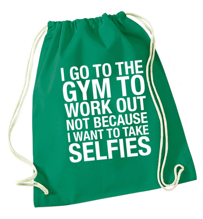 I go to the gym to workout not to take selfies green drawstring bag