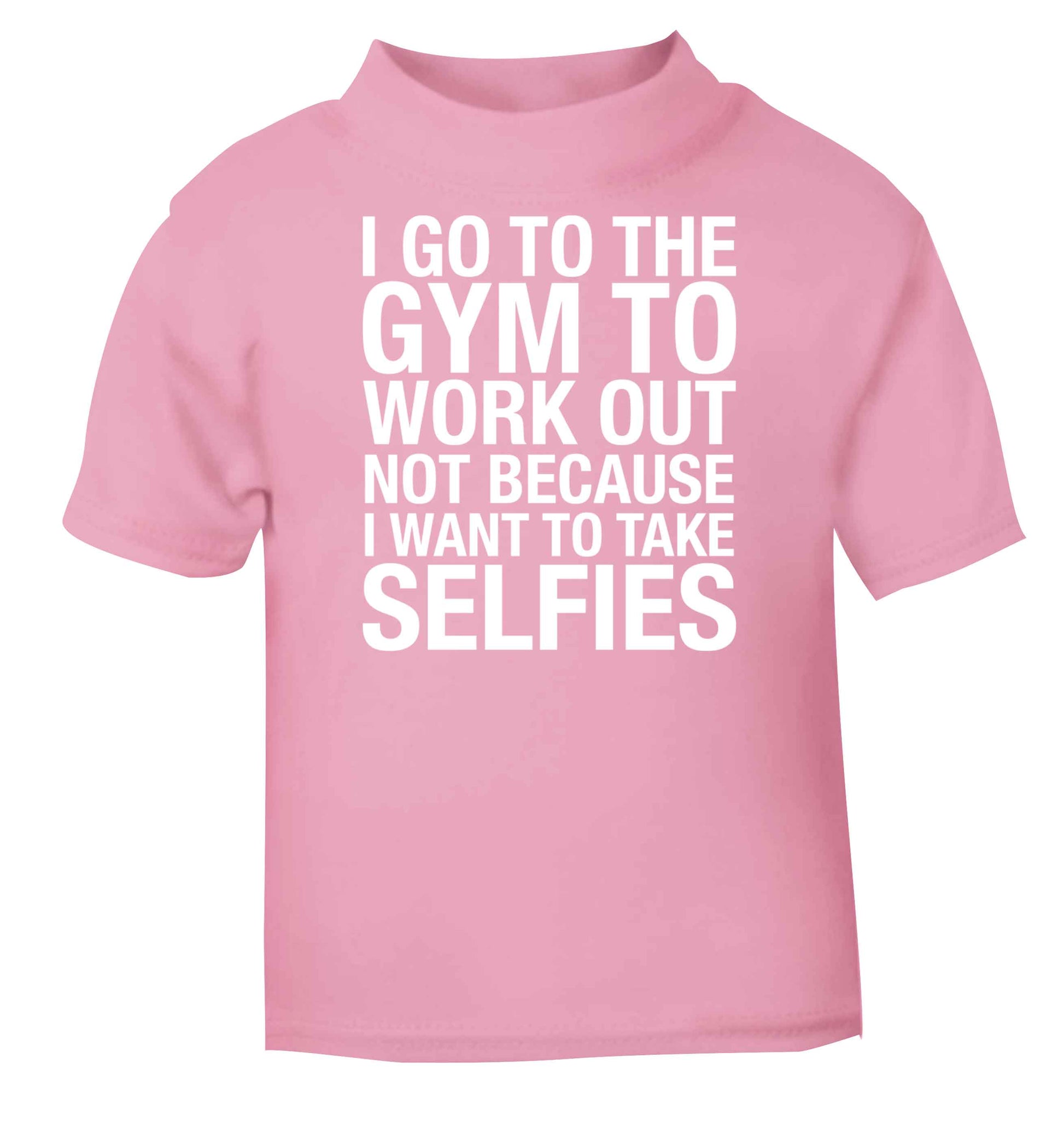 I go to the gym to workout not to take selfies light pink baby toddler Tshirt 2 Years