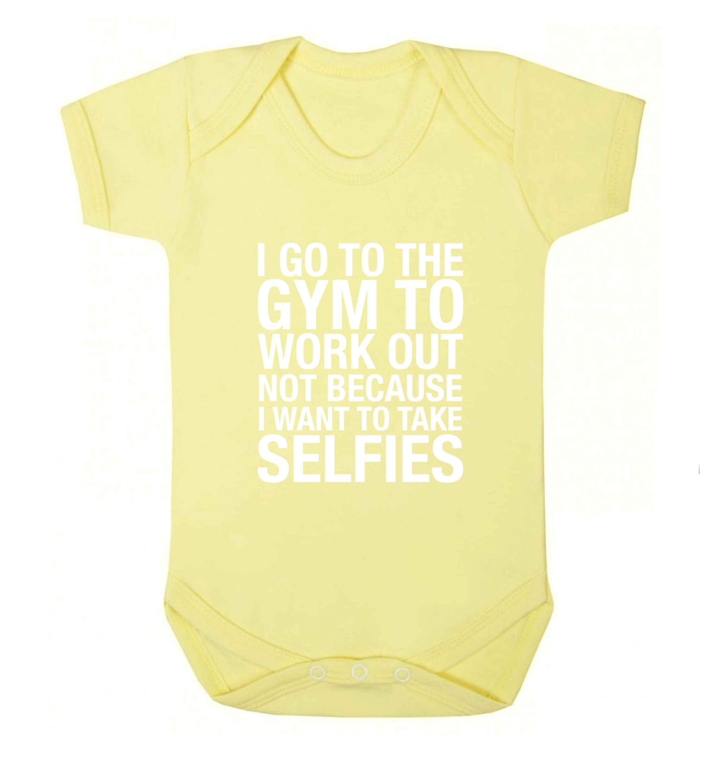 I go to the gym to workout not to take selfies baby vest pale yellow 18-24 months