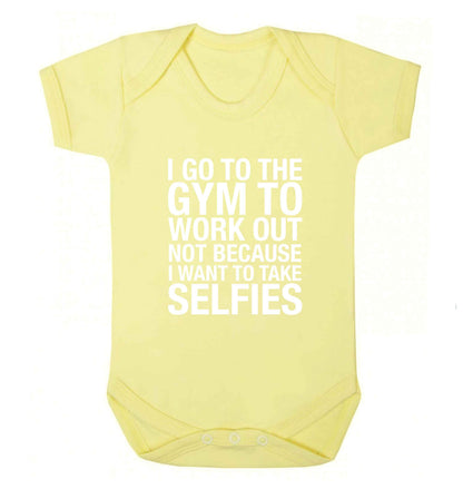 I go to the gym to workout not to take selfies baby vest pale yellow 18-24 months