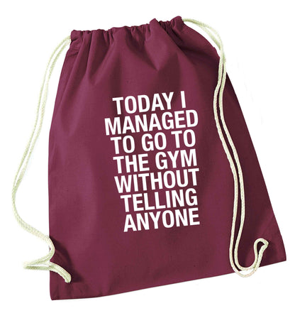 Today I managed to go to the gym without telling anyone maroon drawstring bag