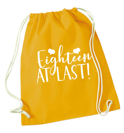 Eighteen at last!mustard drawstring bag
