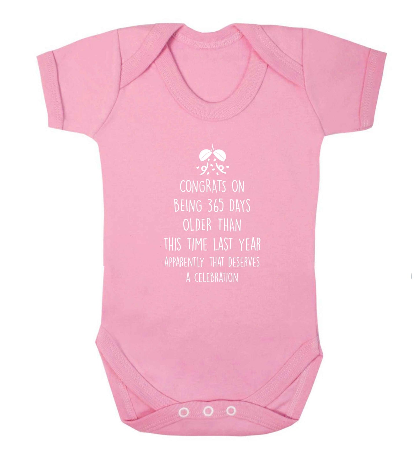 Congrats on being 365 days older than you were this time last year apparently that deserves a celebration baby vest pale pink 18-24 months