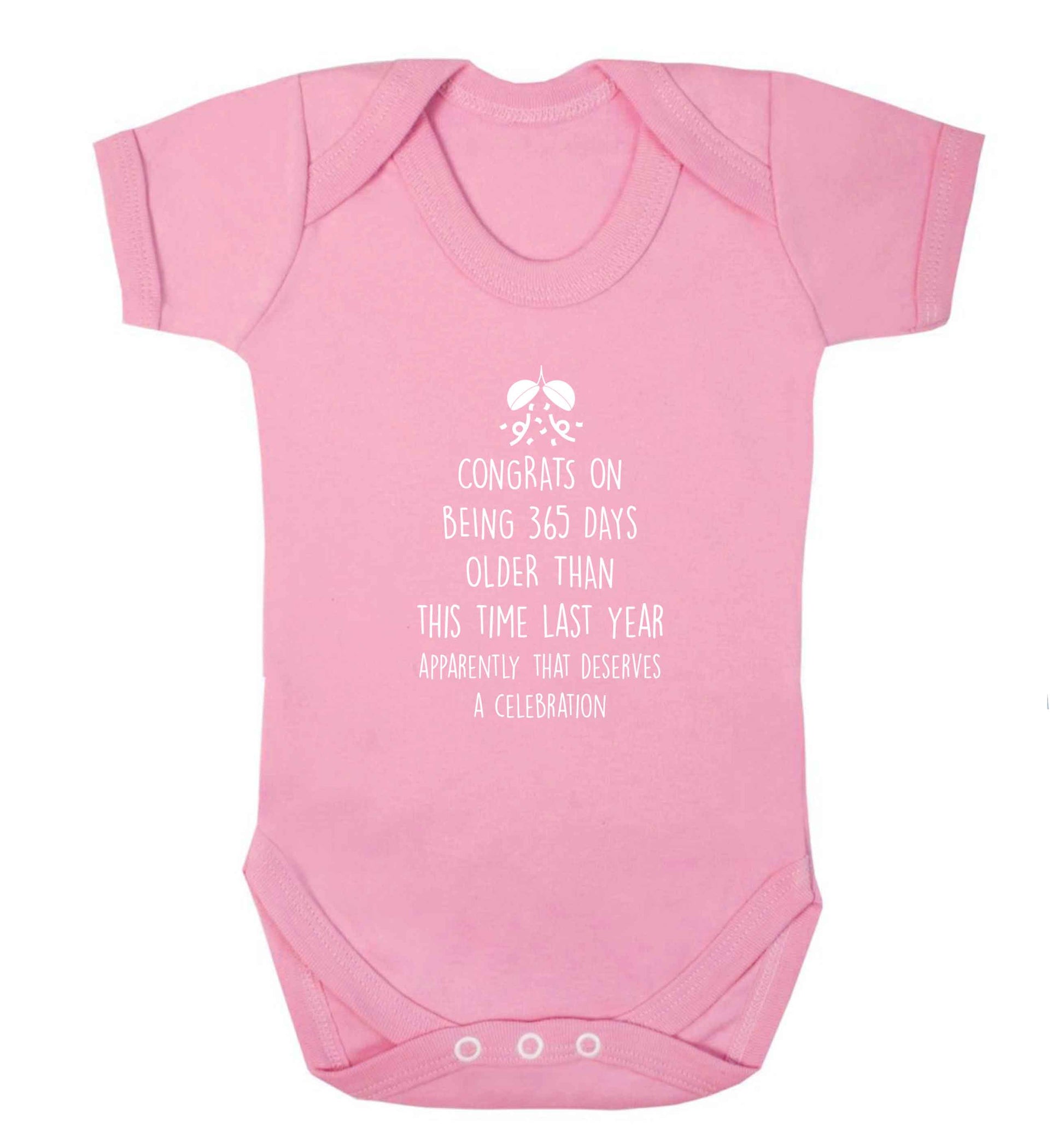 Congrats on being 365 days older than you were this time last year apparently that deserves a celebration baby vest pale pink 18-24 months