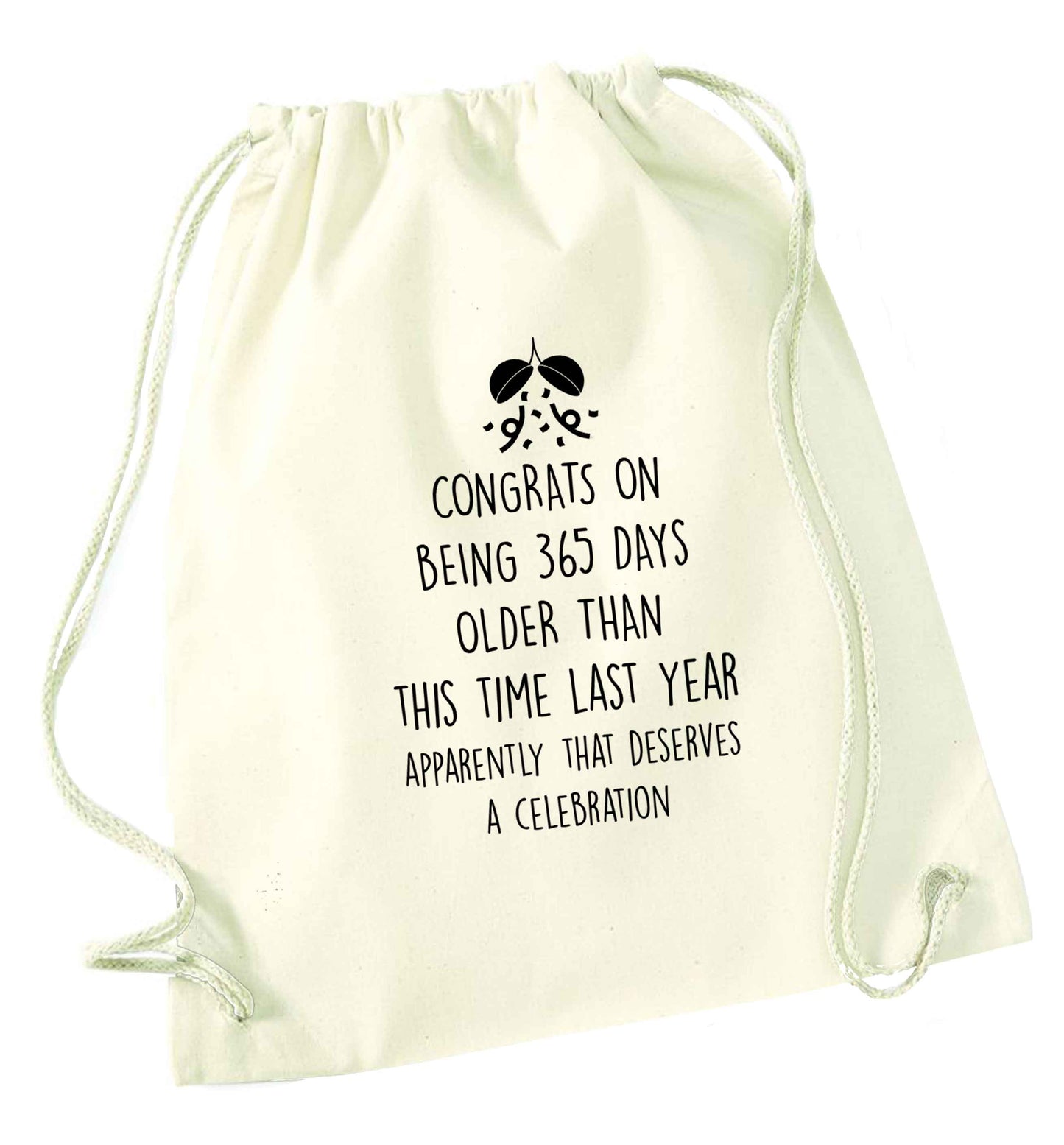 Congrats on being 365 days older than you were this time last year apparently that deserves a celebration natural drawstring bag