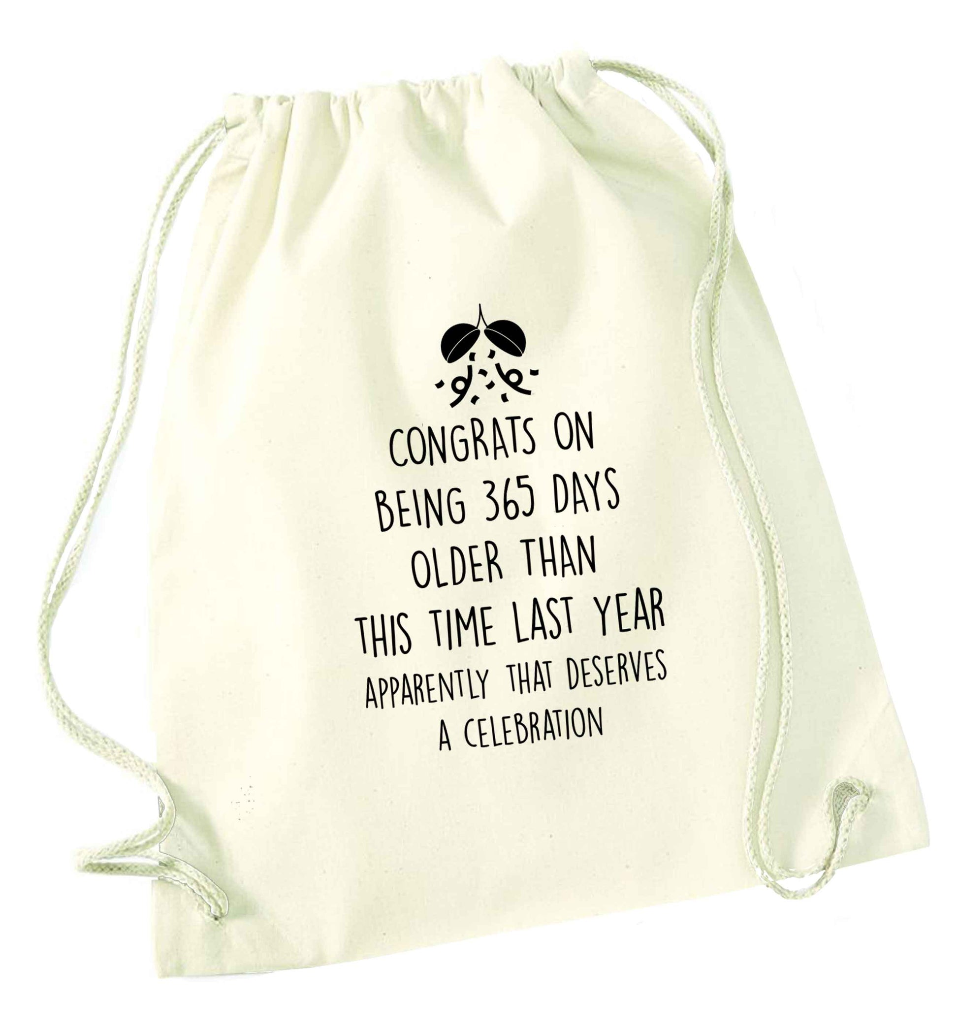 Congrats on being 365 days older than you were this time last year apparently that deserves a celebration natural drawstring bag