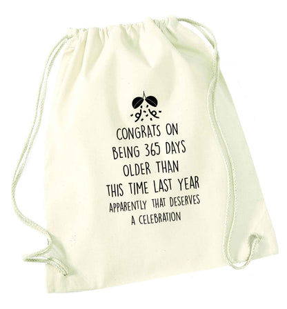 Congrats on being 365 days older than you were this time last year apparently that deserves a celebration natural drawstring bag
