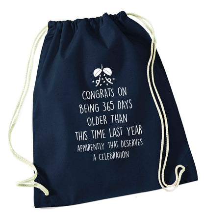 Congrats on being 365 days older than you were this time last year apparently that deserves a celebration navy drawstring bag
