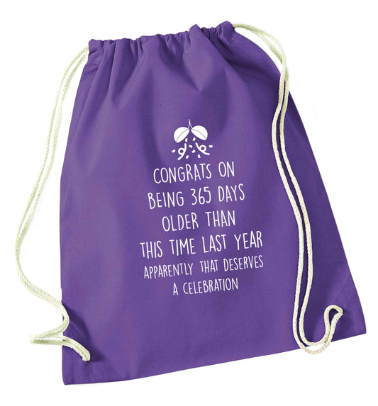 Congrats on being 365 days older than you were this time last year apparently that deserves a celebration purple drawstring bag