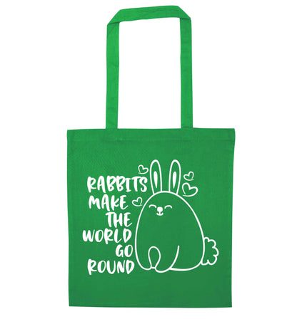 Rabbits make the world go round green tote bag