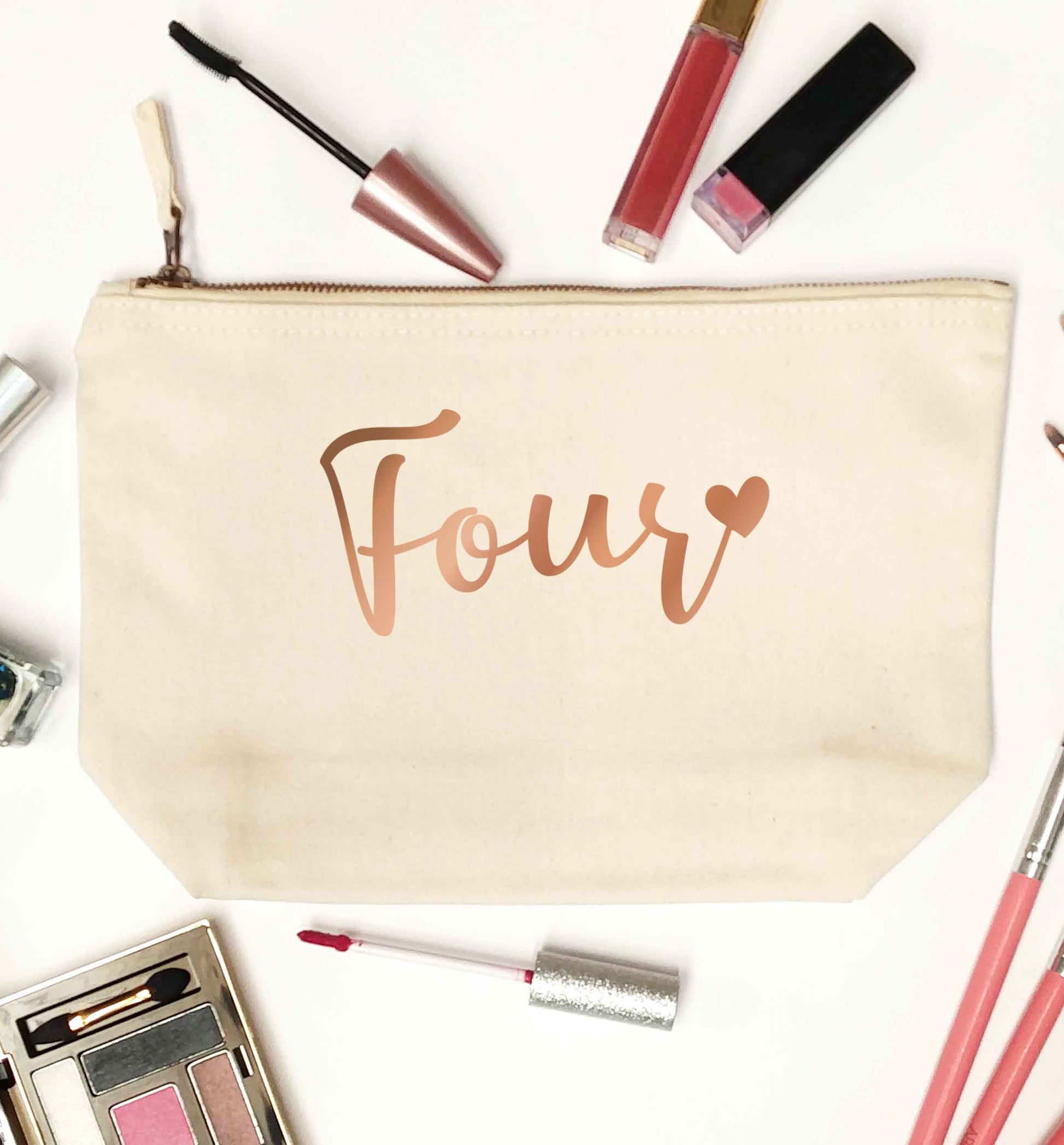 Four rose gold natural makeup bag