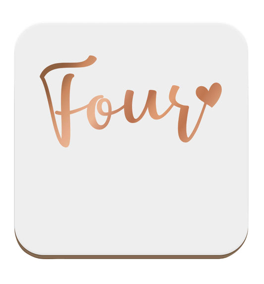 Four rose gold set of four coasters