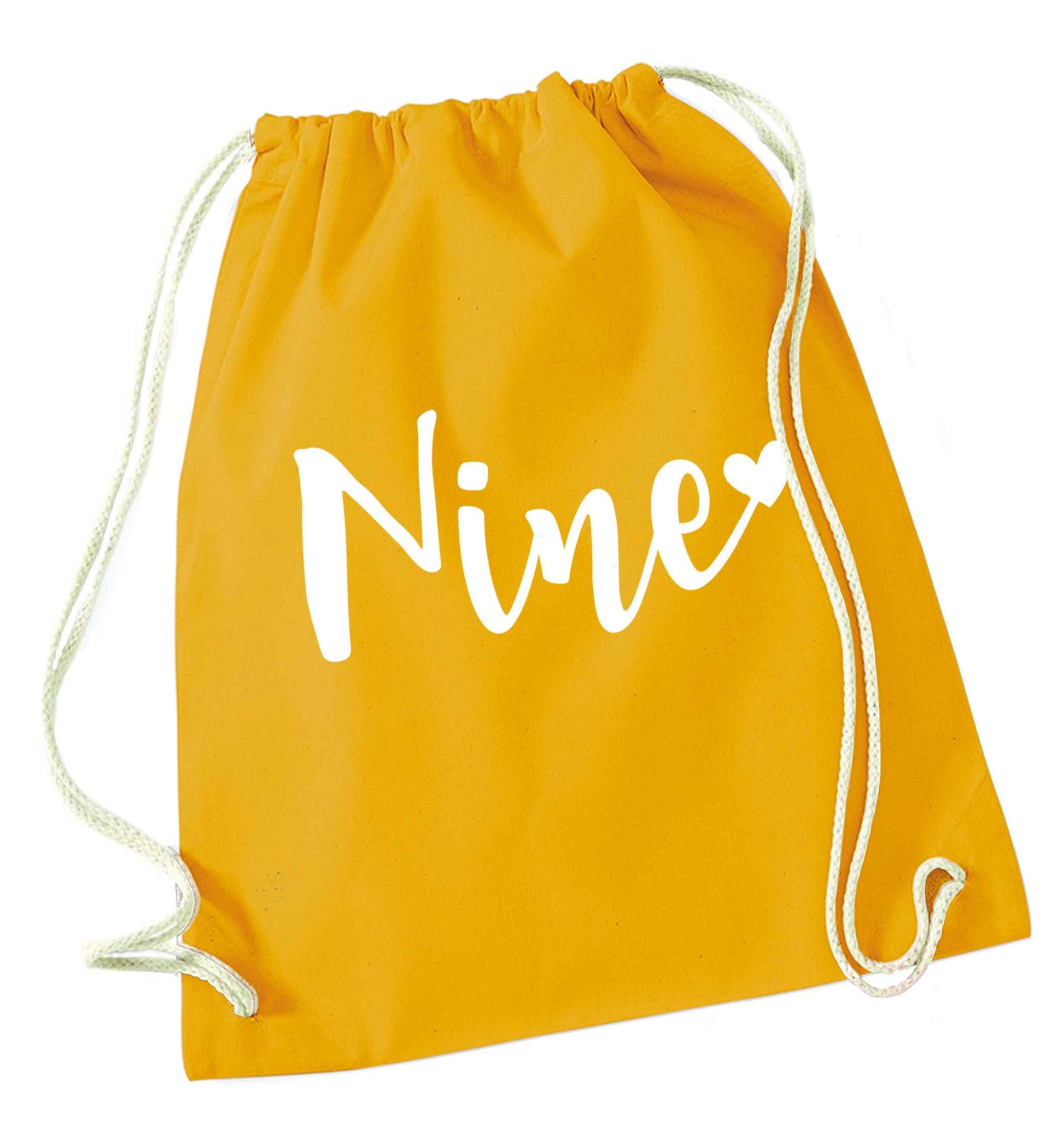 Nine and heart mustard drawstring bag